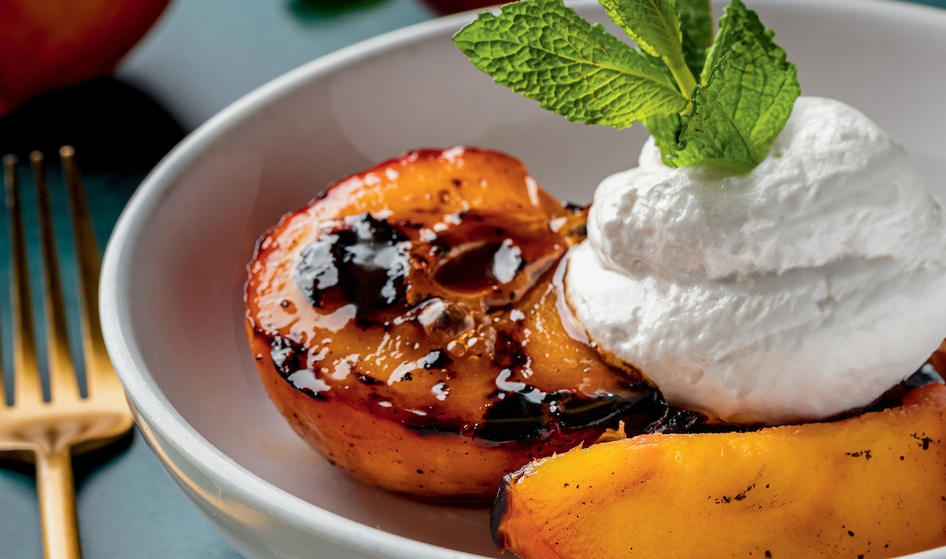 Smoked Peaches With Boozy Vegan Rum Whip VegNews